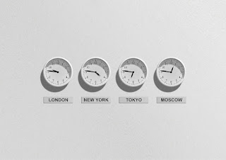 Image of clocks showing times in London, New York, Tokyo and Moscow