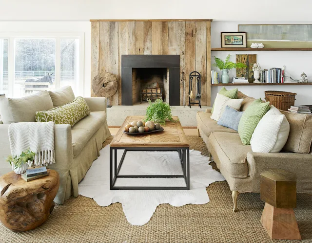 Two sofas on either side of fireplace Heather Bullard