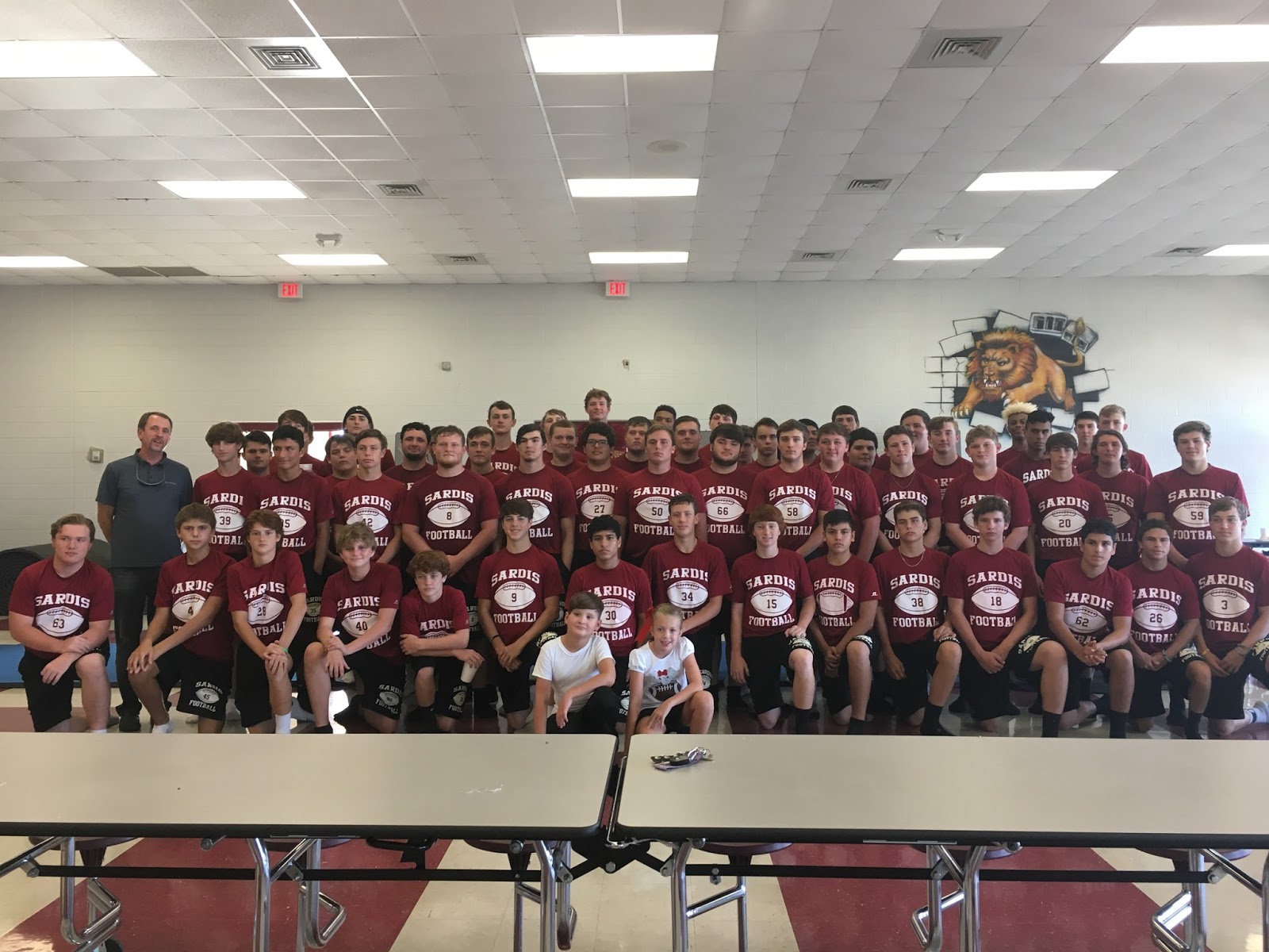 Maggie Elizabeth Feeding the Football Team