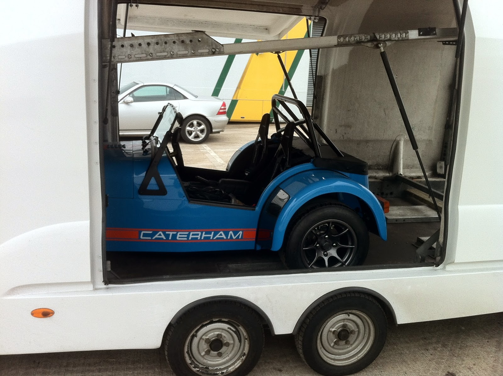 Side view of the car in the transporter (fitted with standard tillet seats) Side view of the car in the transporter (fitted with standard tillet seats)