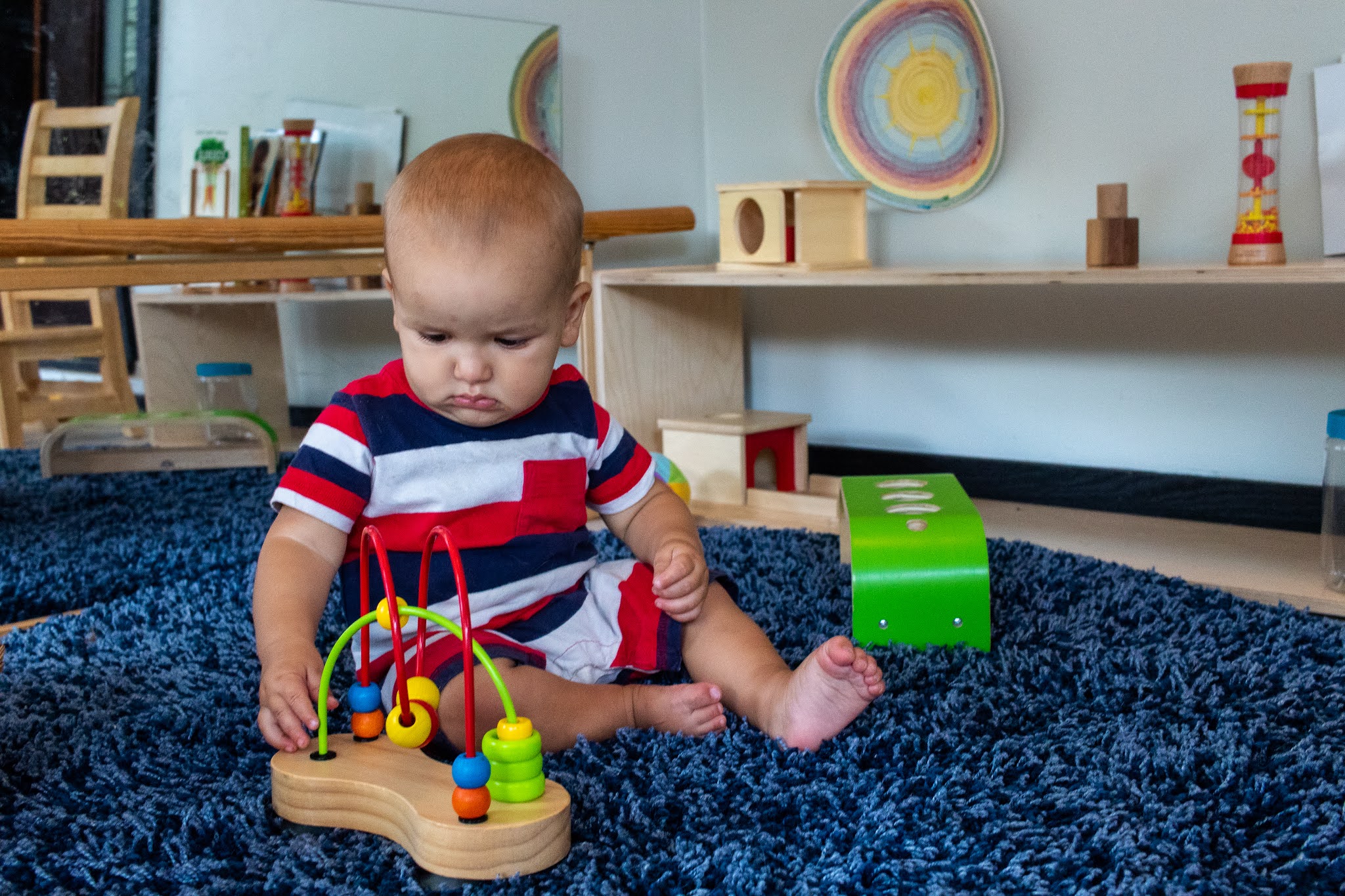 Bead movers are a wonderful Montessori baby activity. Here are some options and ideas to look for when considering a bead mover for your baby.