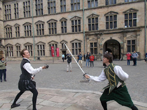 A scene from "Hamlet" performed on Kronborg grounds.