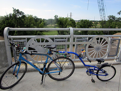 Tag-A-Long and bike on bridge