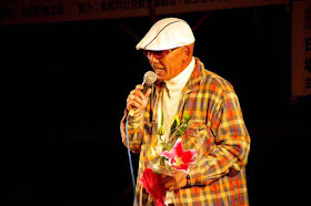 male singer, karaoke contest, flowers