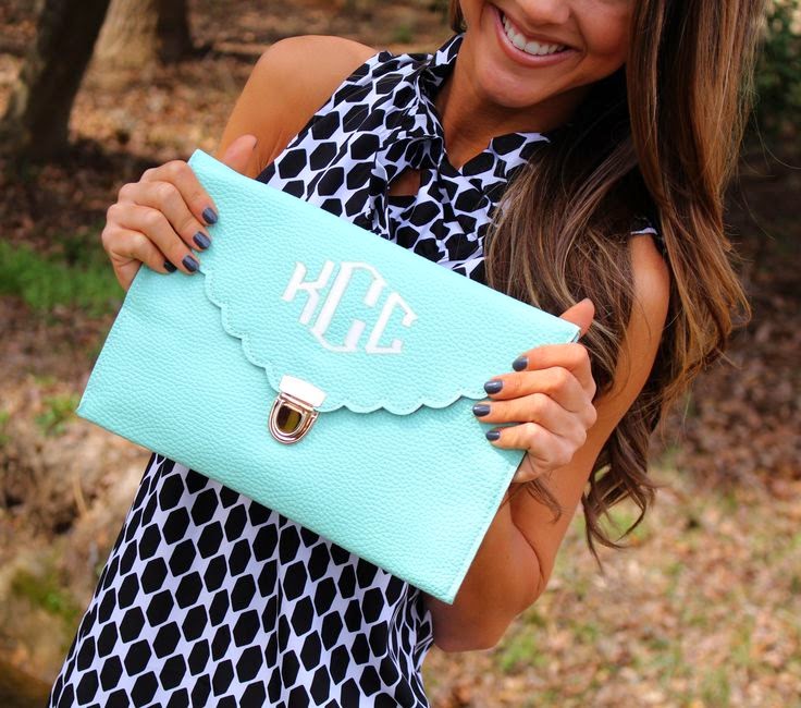 https://marleylilly.com/product/monogrammed-scalloped-luxe-cross-body-clutch/