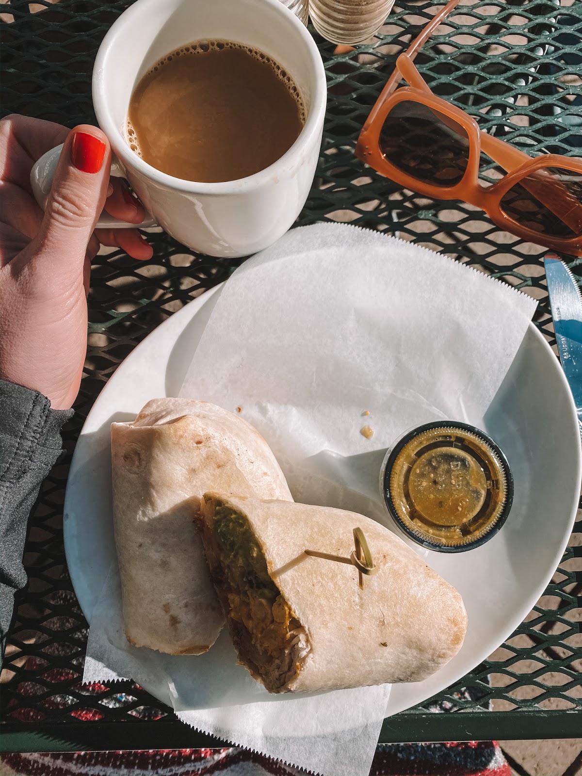 Travel blogger Amanda's OK devours the breakfast burrito at Indian Gardens Cafe in Sedona