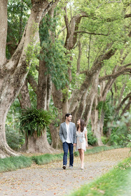 couple walking through forest