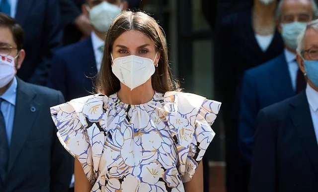 Queen Letizia wore a new double sleeve ruffle top from Psophia, and white suede espadrille wedges from Macarena, and Castaner wedges