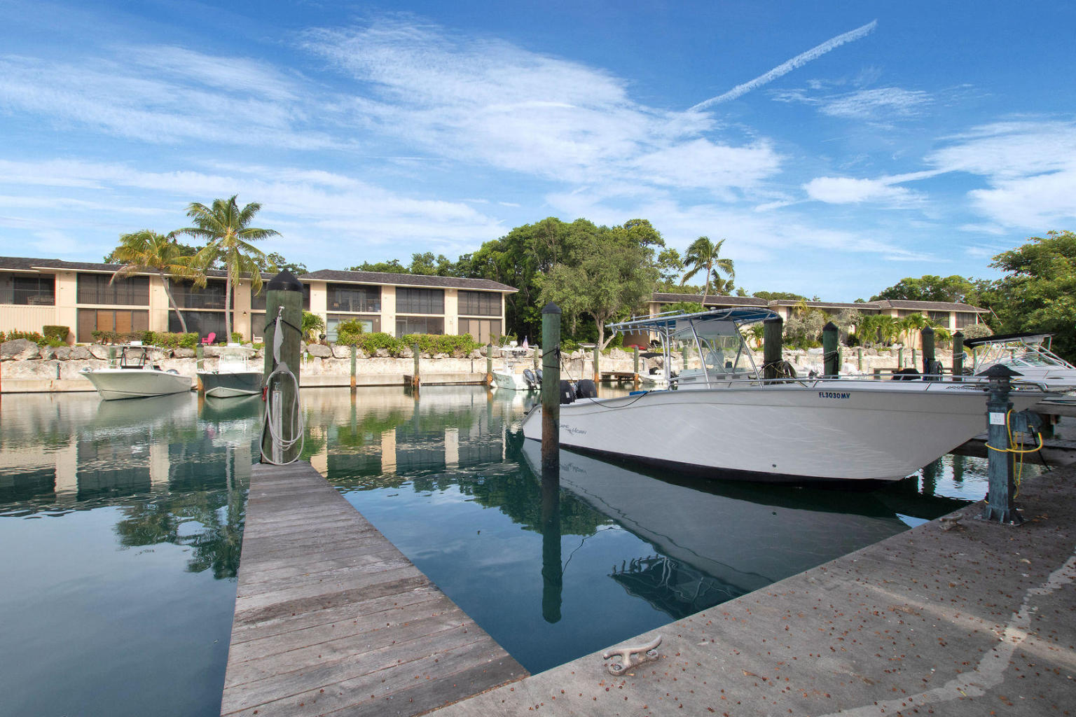 Real Estate in the Florida Keys Buttonwood Bay unit with 36' slip UNDER CONTRACT!