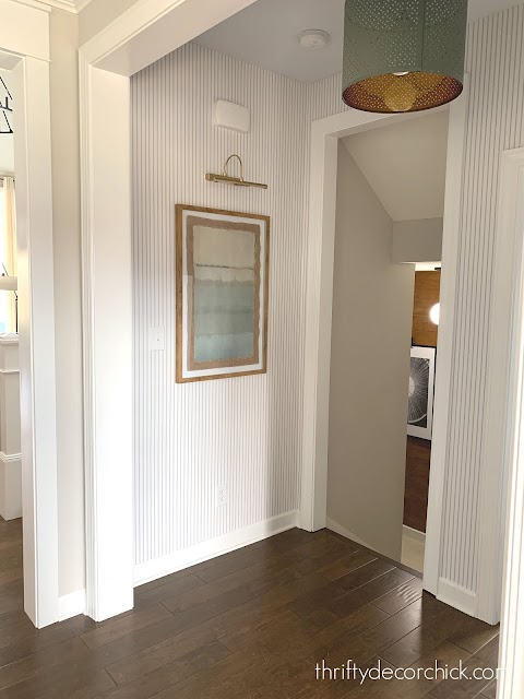 pinstripe blue white wallpaper hallway