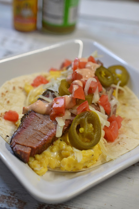 Green chile brisket breakfast tacos cooked on a big green egg kamado grill