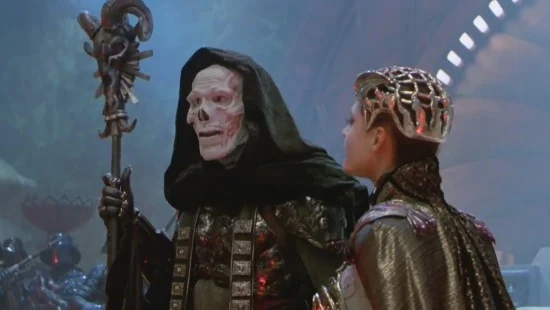 SKELETOR (LANGELLA) Y EVIL-LYN (MEG FOSTER)