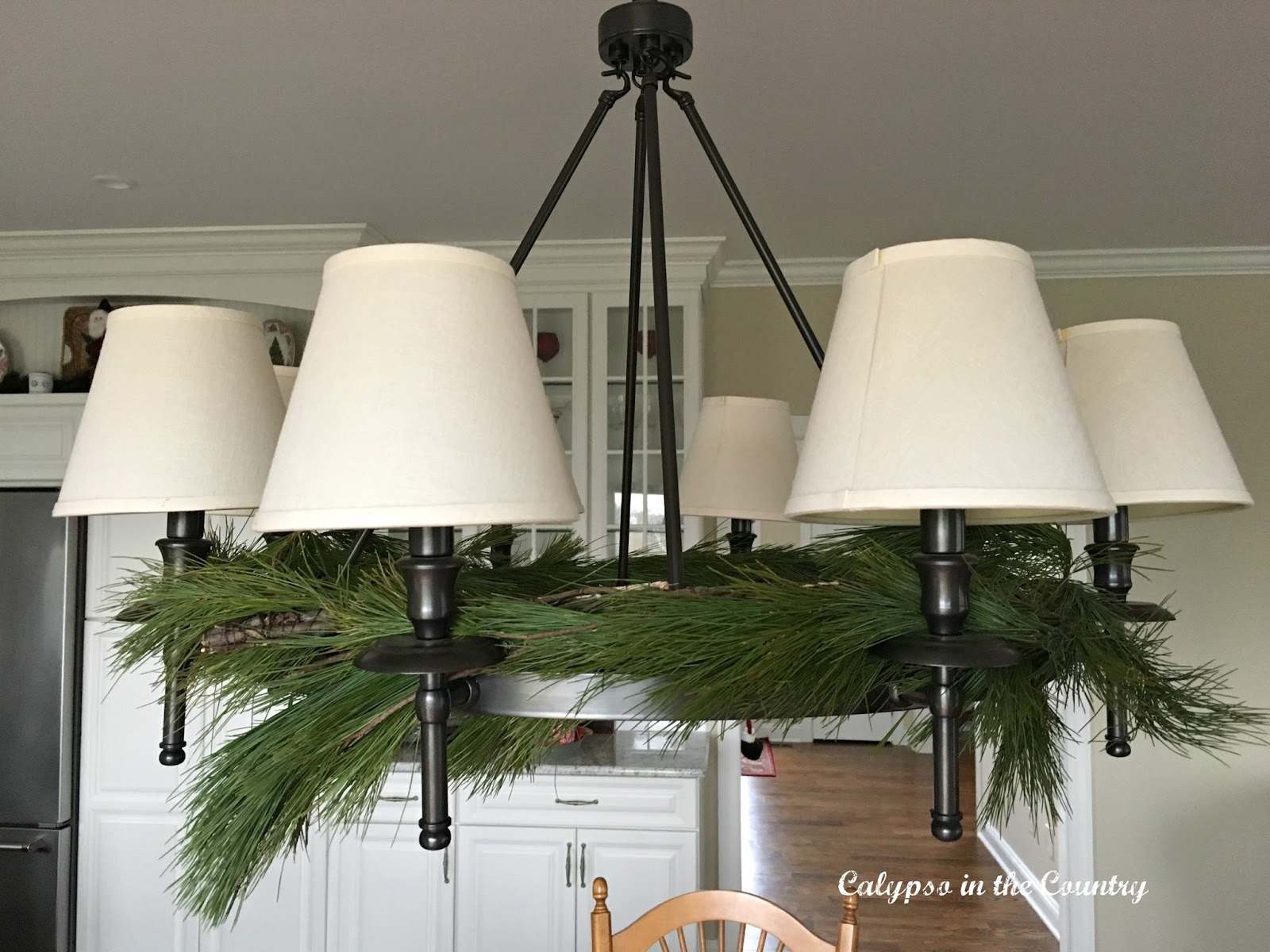 Chandelier with fresh greens Chandelier with fresh greens for Christmas