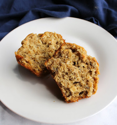 Tender muffins loaded with banana and oatmeal are a snap to make. This easy recipe comes together in no time. They are a great way to incorporate some fruit and oatmeal into your breakfast or snack repertoire. inside of a banana oat muffin that was split in half