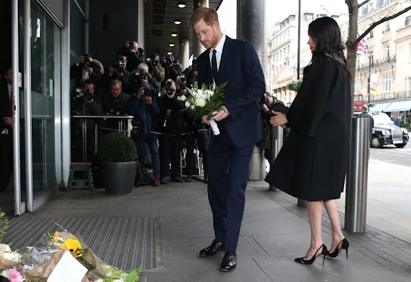 Meghan Markle is wearing custom Gucci coat and shoes by Aquazzura