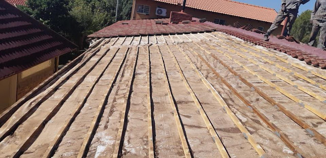 Batons replaced on a low pitch tile roof
