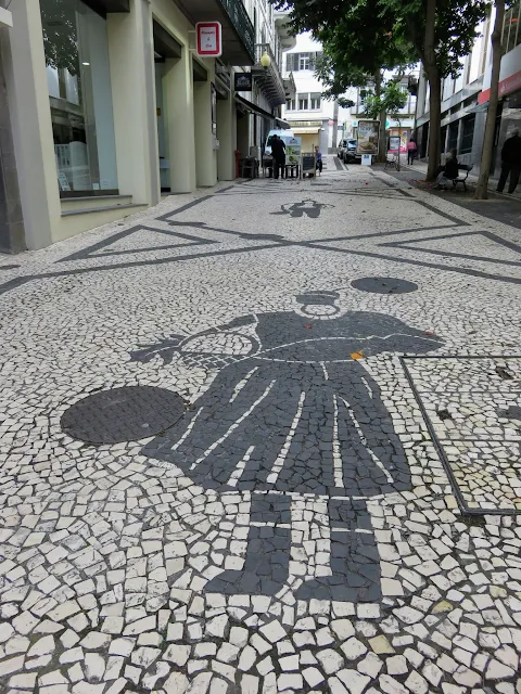 Patterned mosaic stone street in Funchal, Madeira