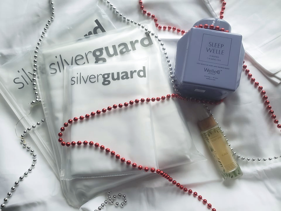 sustainable home gift ideas from Silver Guard bedding, Gaia sleep spray, and WelleCo calming tea