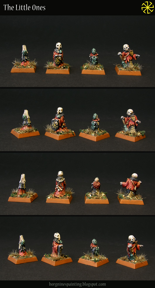 4 tabletop familiars miniatures from Black Crab Miniatures, seen from several angles - they are painted with red and black robes, with either patinated metal masks or ones made from bone.