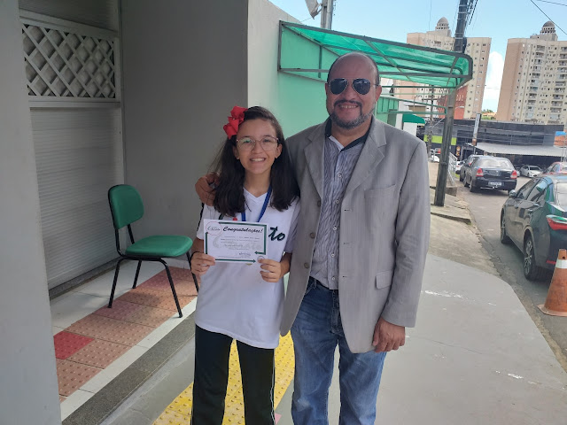 Joana Aline Neves Matos ao lado do pai Dr. Enésio Matos