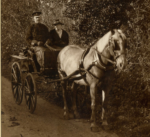 Supt. Beck in uniform with his wife in a pony and trap