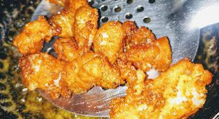 Deep frying Bombay duck for bombil fish fry recipe