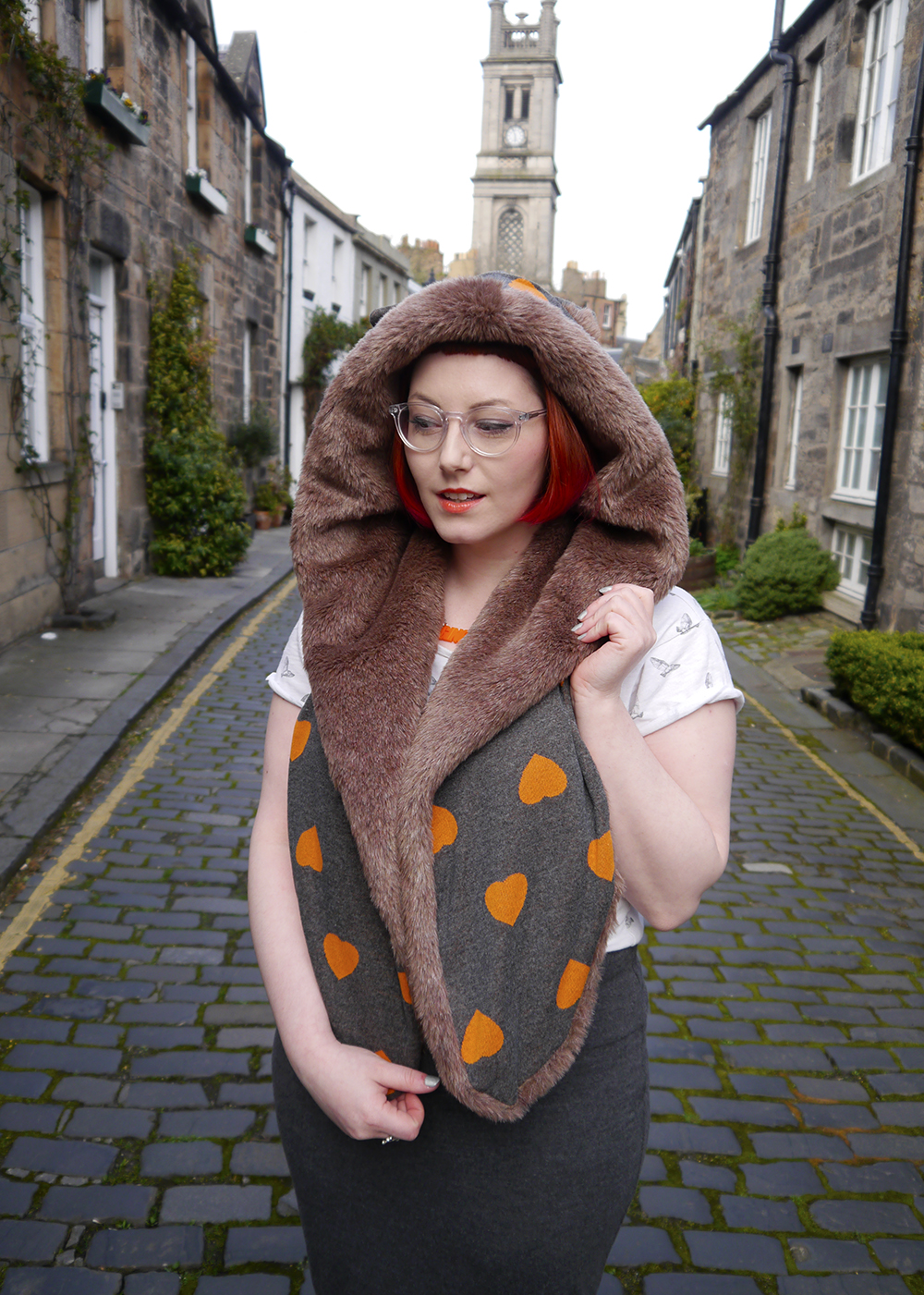 Hood Styling on the Streets of Edinburgh Styled by Helen, Scottish blogger, Scottish fashion blogger, red head, Chouchou, Chouchou Couture, fashion hood, hood scarf, kitty hood, kitty ears, faux fur, love heart print, pops of orange, bonnie bling, ginger, giner necklace, casual day look, casual everyday style, Edinburgh, Stockbridge Edinburgh, Edinburgh blogger, independent designer, #HOODGIRL