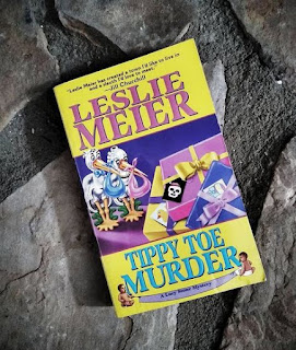 book review tippy toe murder leslie meier