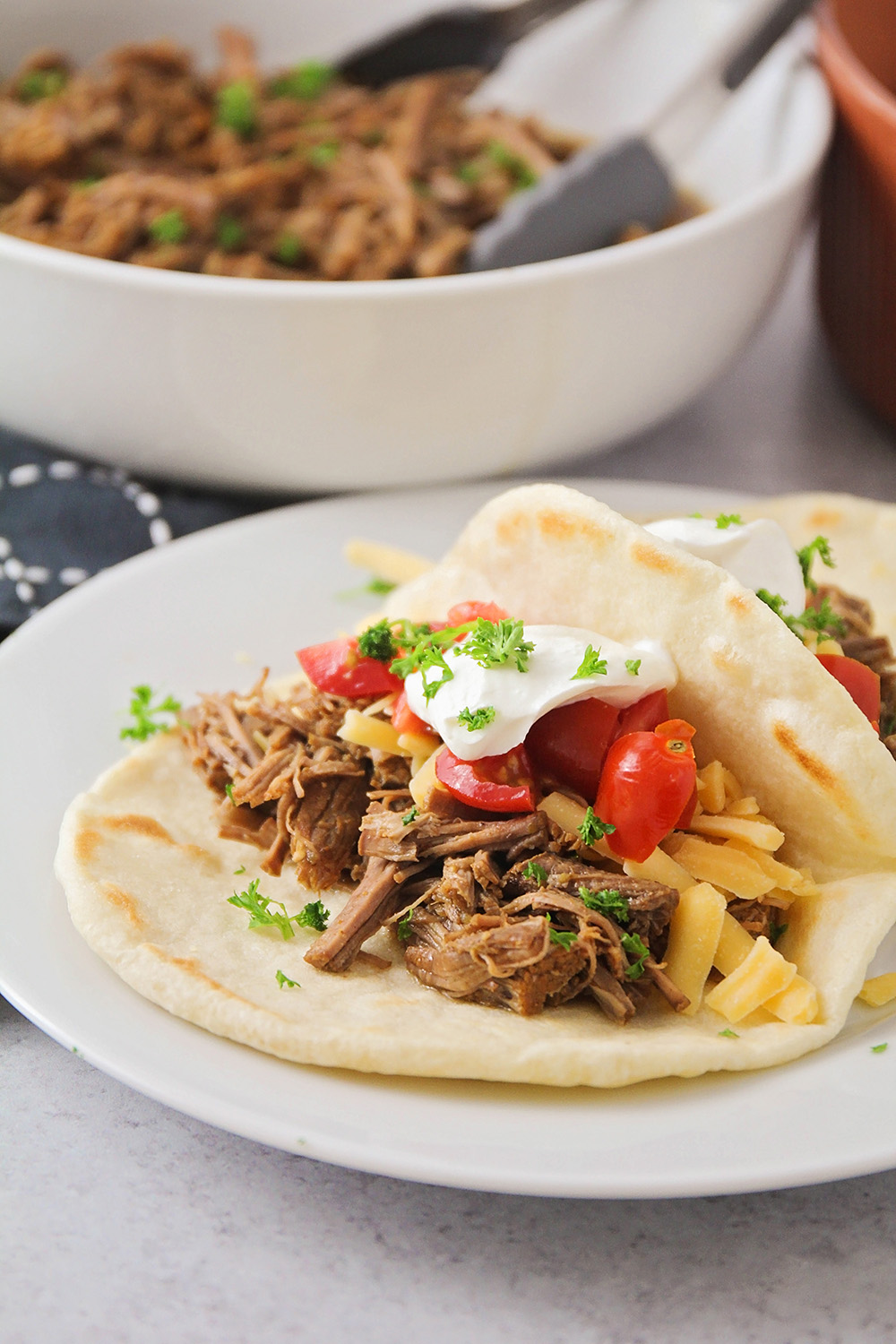 These Instant Pot shredded beef tacos are so easy to make, and full of delicious flavor!