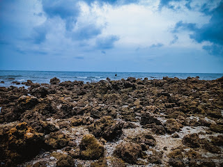Cloudy Atmosphere On Rocky Coastline Of Fishing Beach At Umeanyar Village, North Bali, Indonesia