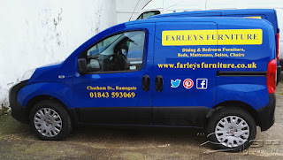 Farleys Furniture yellow vinyl vehicle livery. Text on the side of the van reads Dining & Bedroom Furniture, Beds, Mattresses, Suites and Chairs. Underneath has the website address www.farleysfurniture.co.uk. The social media logos for twitter, pinterest and facebook have a white halo around them. The door has the address Chatham St., Ramsgate and the phone number 01843 593069 in bright yellow vinyl which stands out on the blue van.