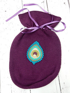 Free crochet pattern by thecuriocraftsroom gift pouch project pouch home decor peacock feather