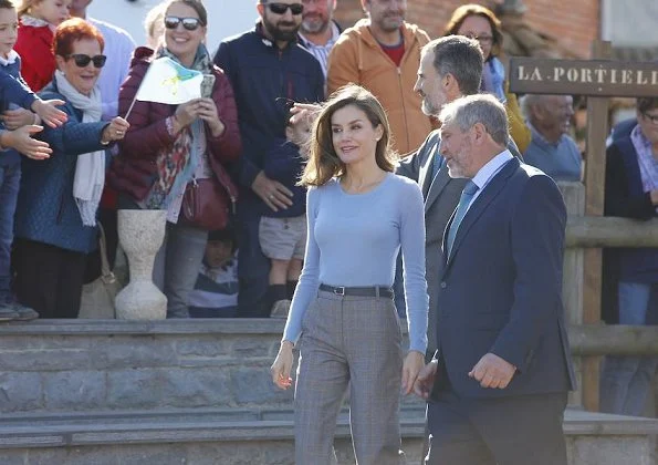 Queen Letizia wore Mango Prince of Wales trousers, Hugo Boss top, and Magrit suede pumps. Style of Letizia