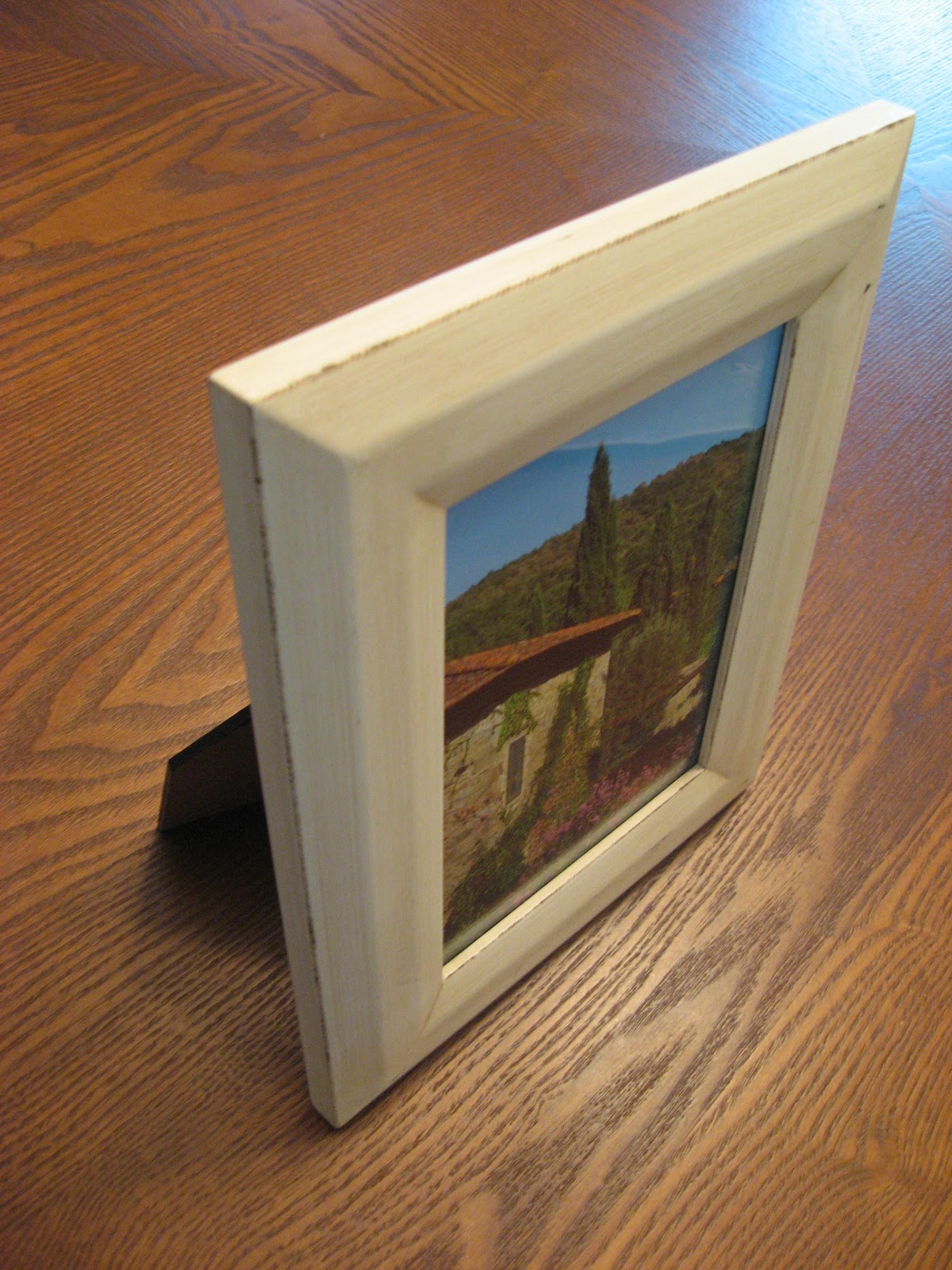 Susan Snyder HANGING A TABLE FRAME ON WALL