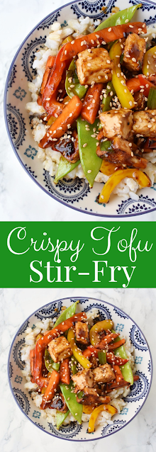 Crispy Tofu Stir-Fry is loaded with crispy flavorful tofu, bell peppers, carrots, peapods and a delicious soy garlic ginger sauce! #tofu #stirfry #rice #asian #chinese #vegetarian #veggies #healthy