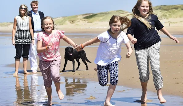 Queen Maxima and King Willem-Alexander, with Princess Amalia and Princess Alexia and Princess Ariane with dog Skipper