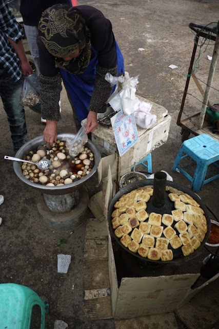 Hui woman selling eggs and tofu