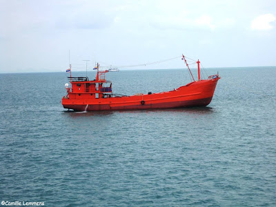 Orange boat outside Nathon harbor