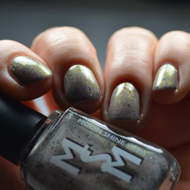 taupe nail polish with shimmer and flakies swatch