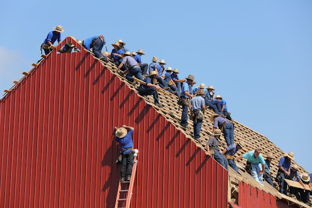 construction workers on a roof