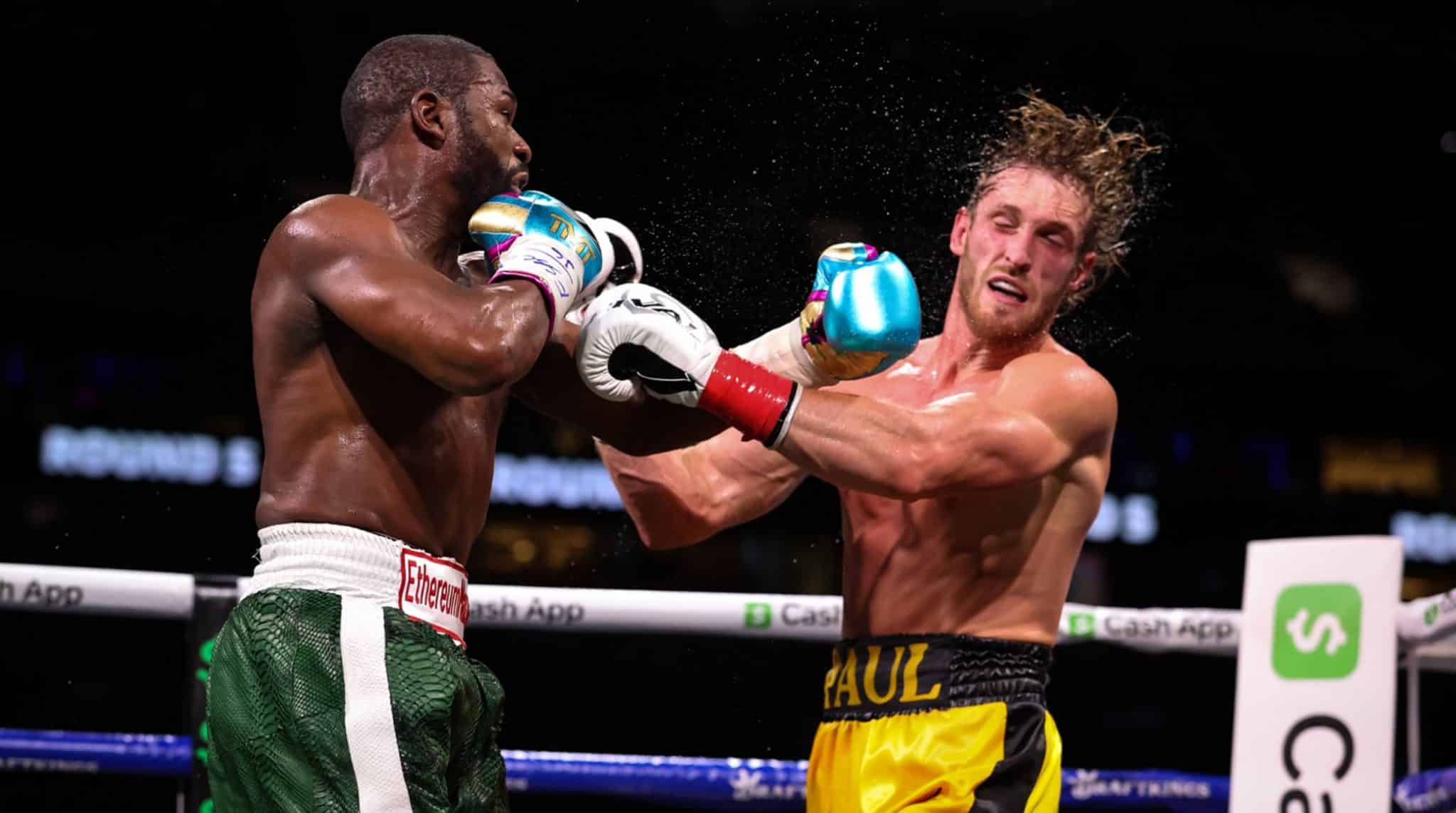 MayweatherPaul Fight Aftermath Floyd KO's Logan, Carries Him Through