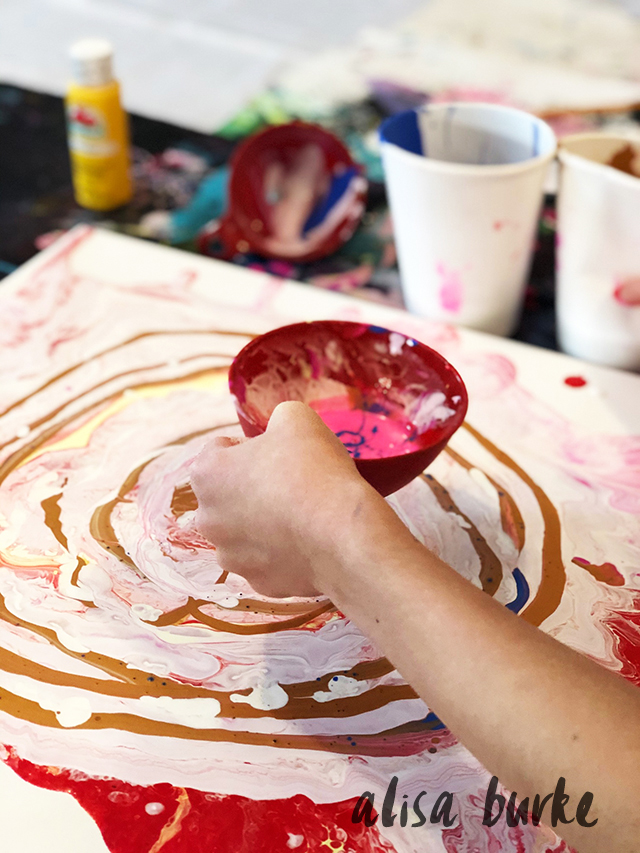 creating with a kid- funnel paint pouring