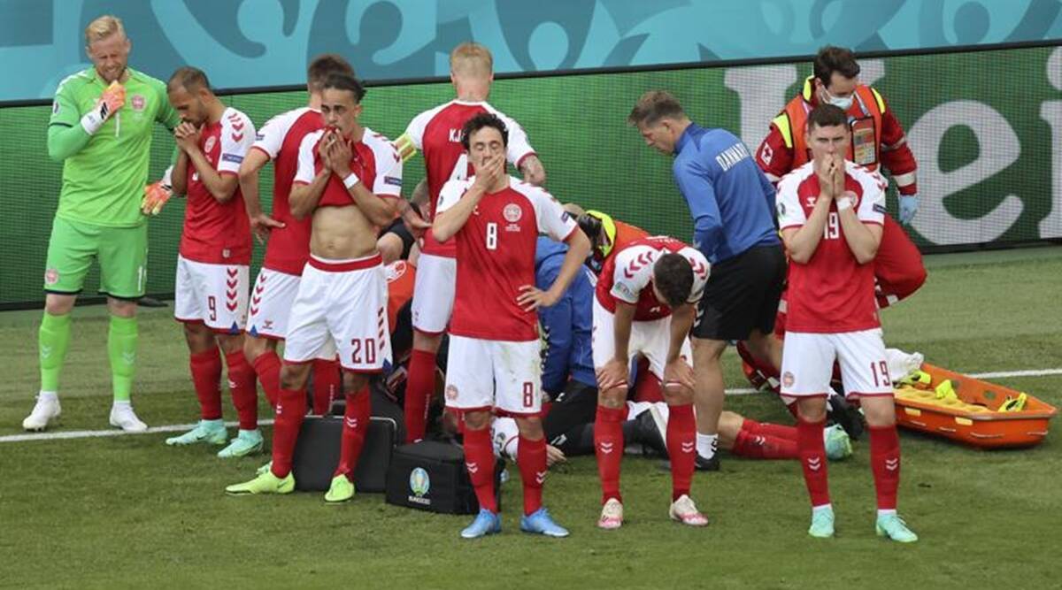 Danish midfielder Eriksen hospitalized after on-field collapse