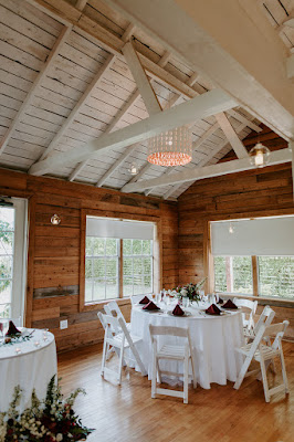 intimate wedding reception white tables