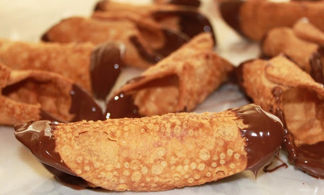 these are cannoli shells dipped into melted chocolate