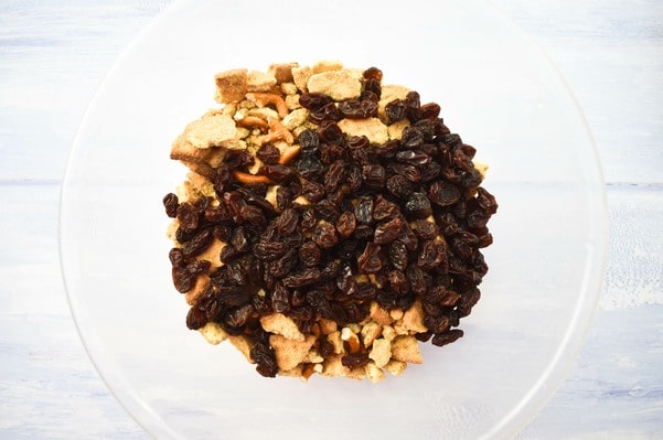 Step 5 - raisins Step 5 - biscuit mix and raisins in a bowl