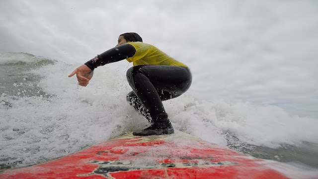 women surfing