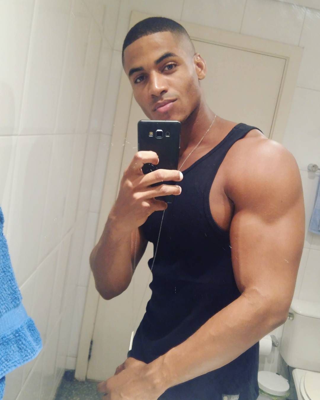 young-fit-pretty-black-men-cute-face-strong-huge-arms-selfie