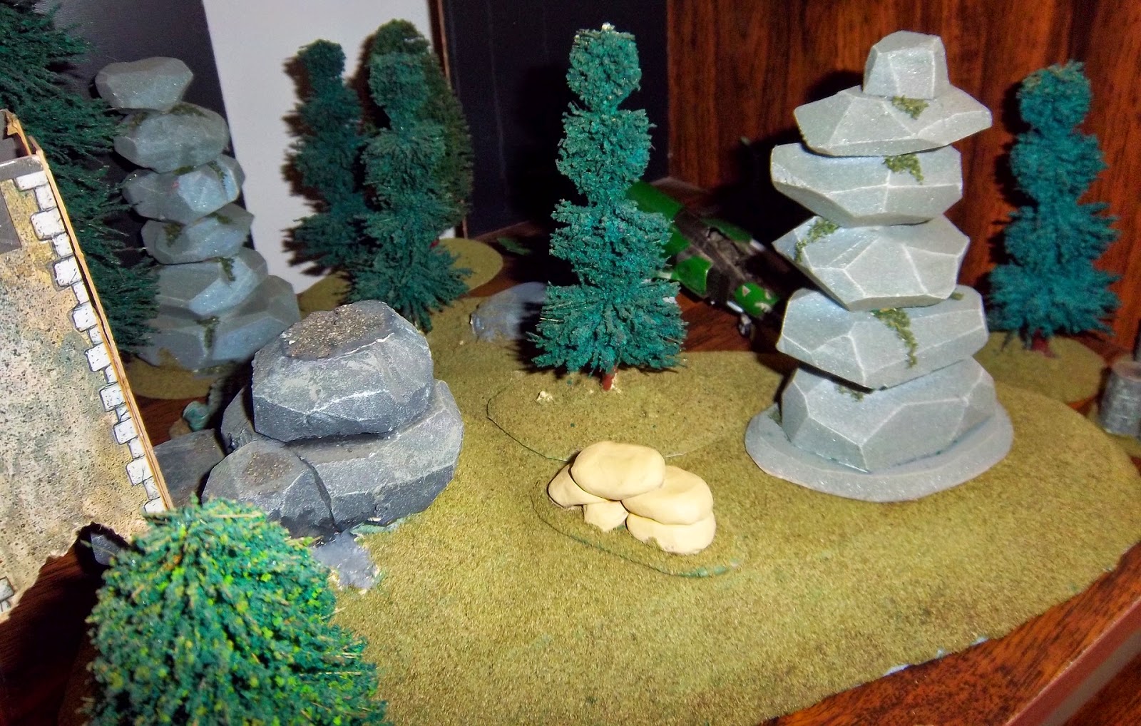 Scenery created by the author: hills, trees, rocks