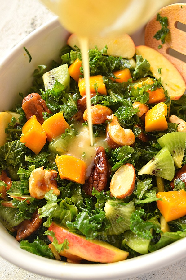a bowl with best kale apple salad with kale salad dressing